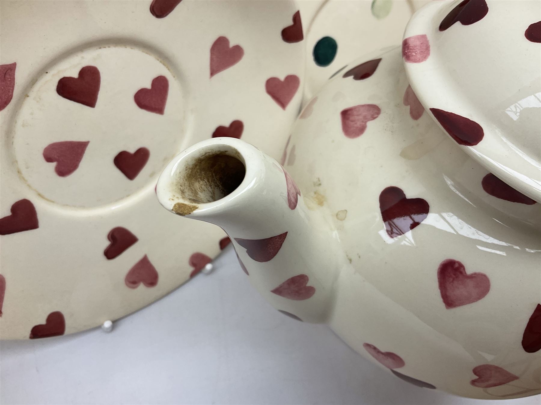 Collection of Emma Bridgewater spongeware ceramics, to include Pink Hearts pattern teapot, milk bottle vase, teacup and saucers, Love & Kisses sugar shaker and large 'I love you more than Marlon Brando' mug, British Birds and Black and White pattern mugs, etc, all with printed marks beneath, tallest H21.5cm