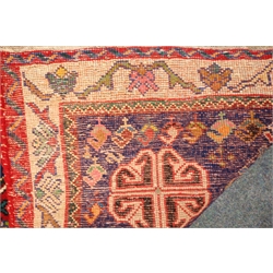  Persian style red ground hand knotted rug, central medallion (181cm x 123cm) and three other rugs (4)  