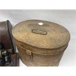 Metal hat box, together with another metal traveling case and a singer sewing machine 