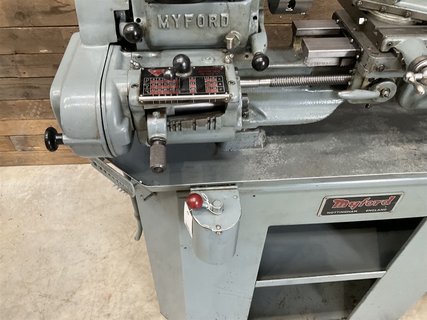 Myford Super 7 metal turning lathe with extensive collection of attachments, chucks, collets, bits; and precision metal saw