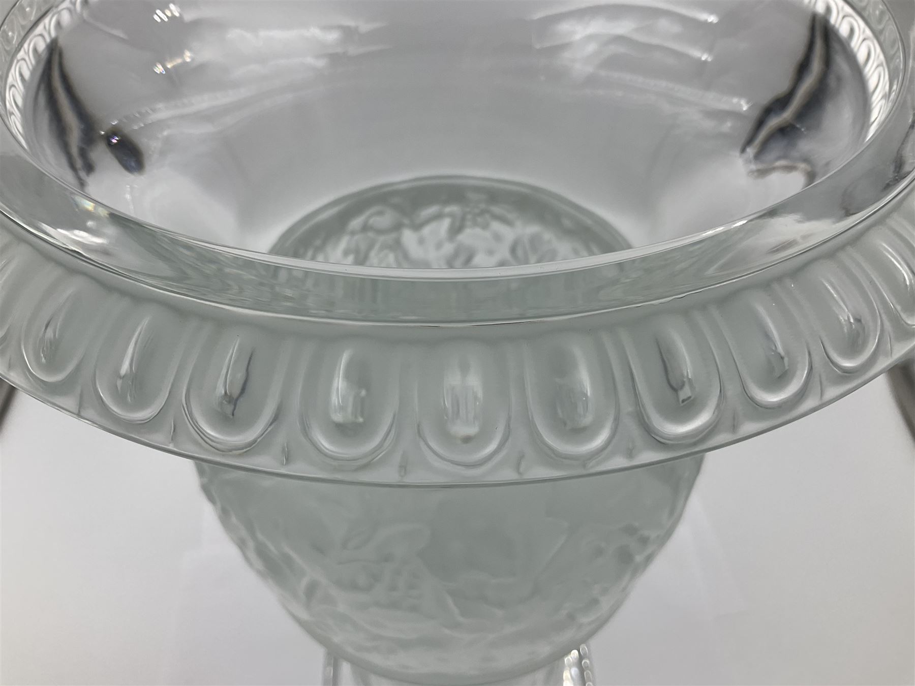 Large and impressive Lalique Versailles pattern glass vase, of classical baluster form with gadrooned flared rim, the body moulded in relief with fruiting vines above part fluting, upon a spreading circular foot with moulded decoration, and plain square plinth base, signed Lalique France to side of plinth, overall H35cm, with original box 