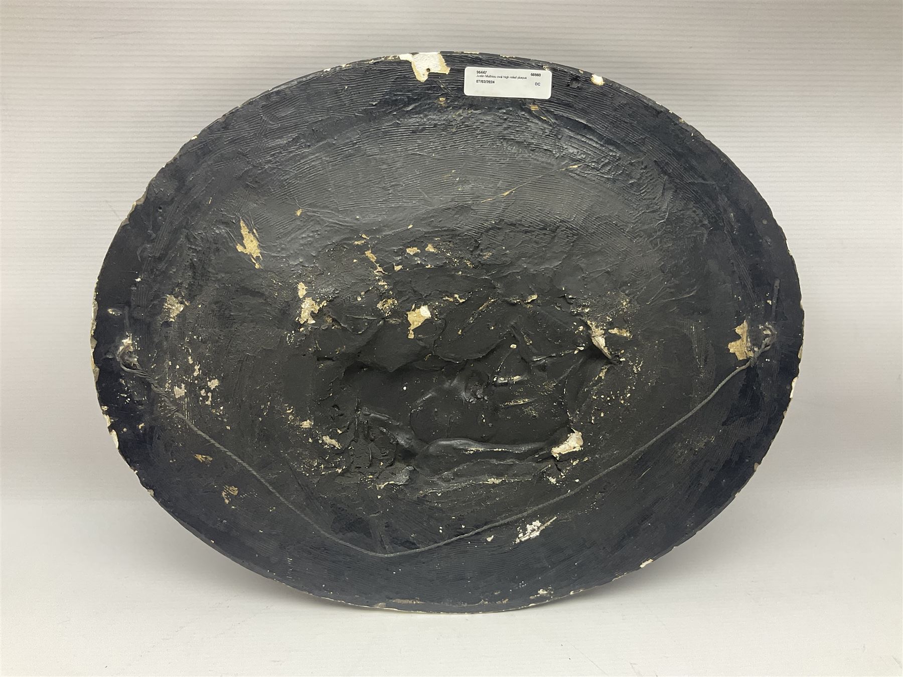 Justin Mathieu; oval high relief plaque depicting a battle scene, within frame H36cm