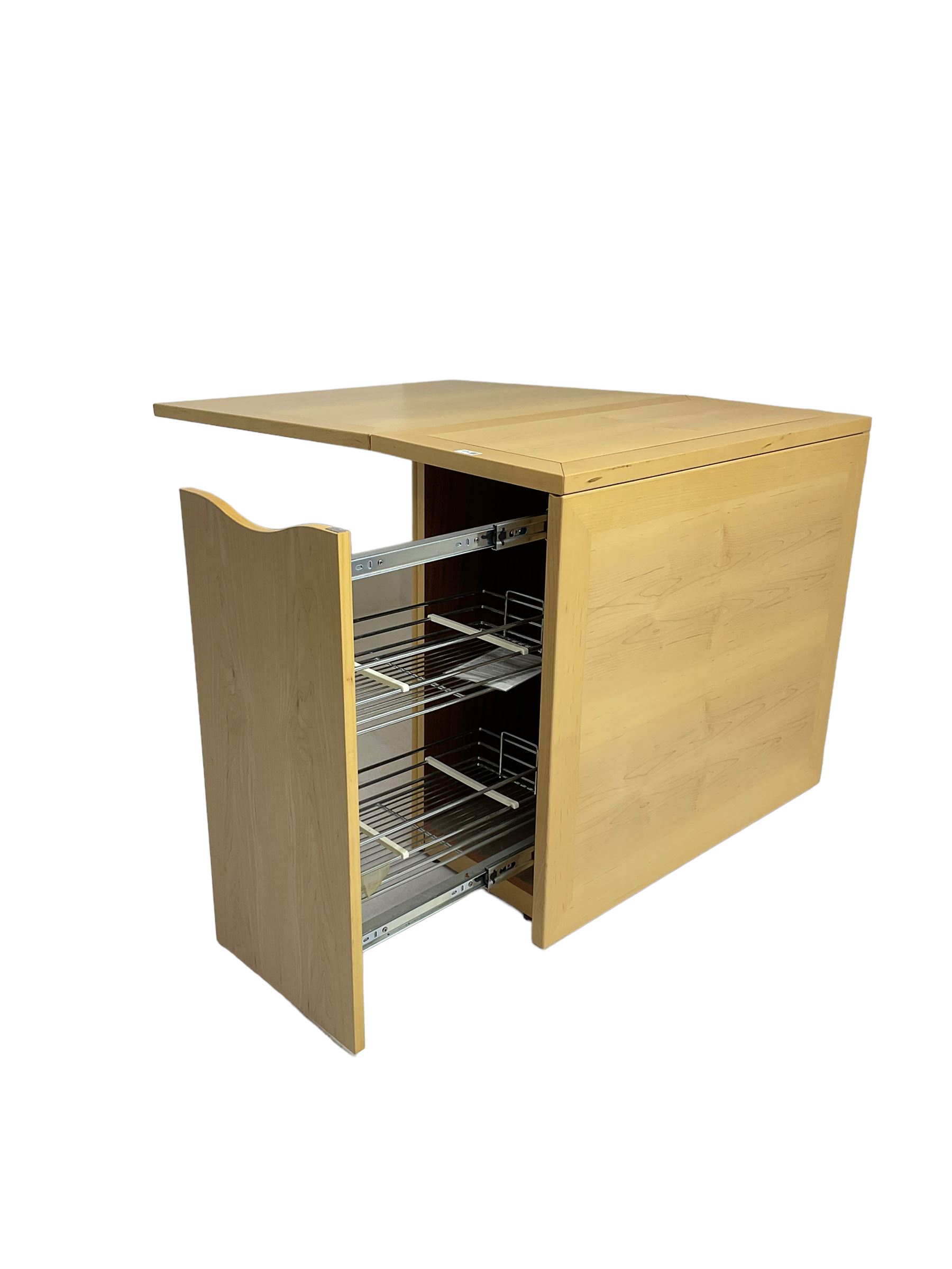 Skovby - 'SM101' drop leaf dining table, fitted with concealed storage compartment 