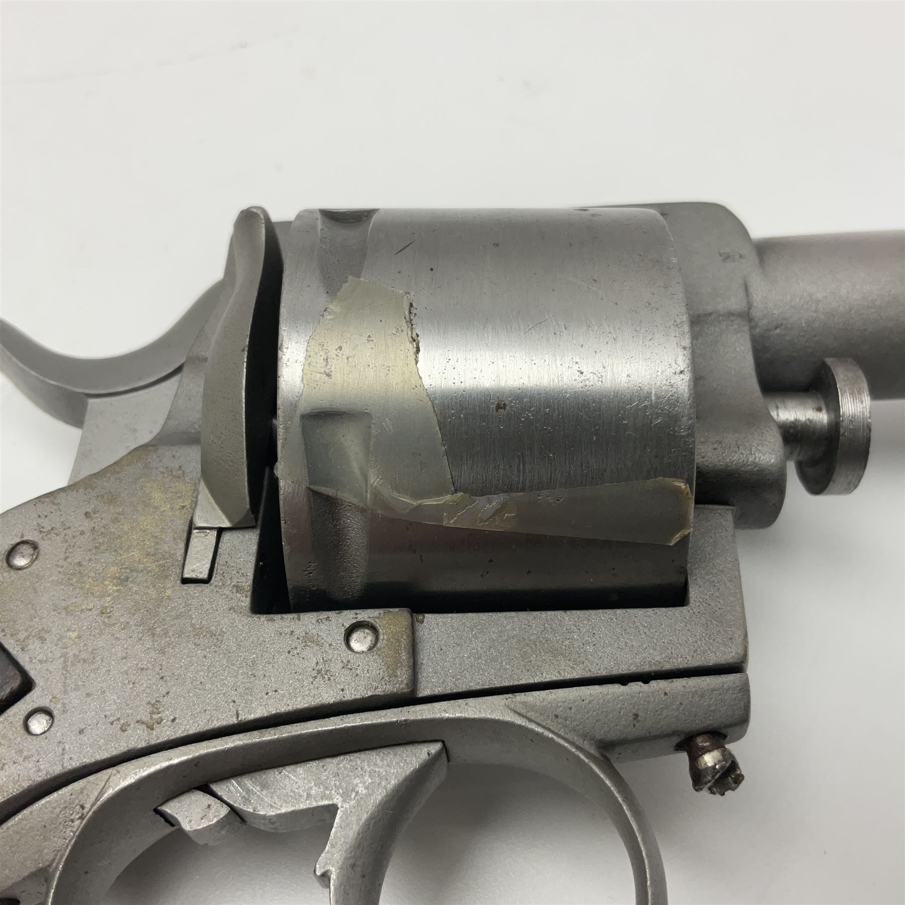 The major parts only of a British Bull-Dog .500 Boxer five-shot revolver comprising stripped down framework, cylinder, trigger with guard, functioning hammer and two-piece chequered grip; retailed by G. Goth Buenos Ayres; Belgian proof marks; L19.5cm overall; in fitted mahogany case 