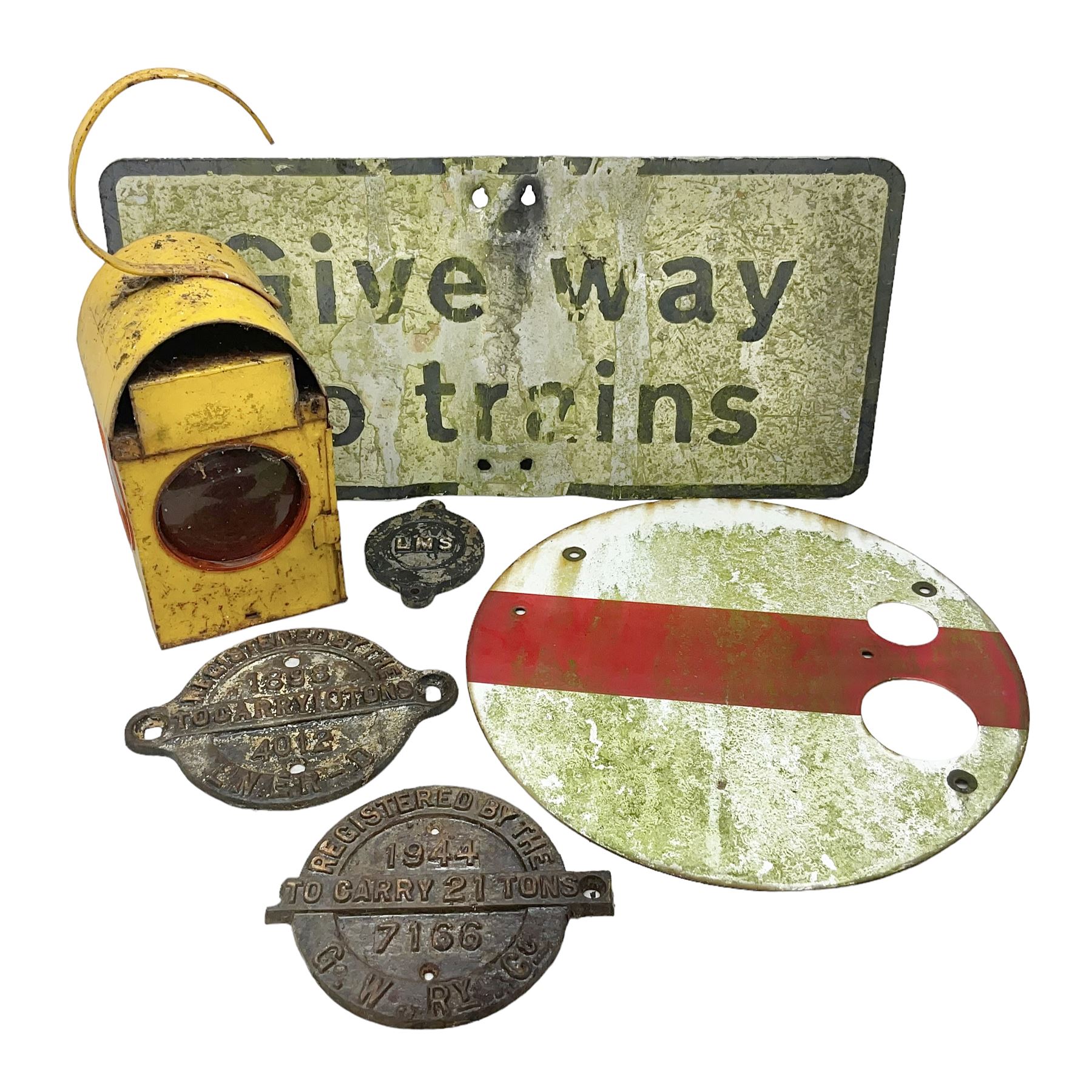 Victorian cast iron railway wagon plate, 'To Carry 10 Tons 4012, Registered by LNER-D 1898', together with a similar mid 20th century example, a smaller cast iron LMS wagon plate, Chalwyn signalling lamp, Give Way to Trains enamel sign and an enamel signal sign