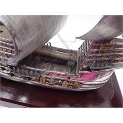 Modern silver limited edition model of The Mary Rose, depicting the ship in full sail, with gilded details, hallmarked Ammonite Ltd, Birmingham 1982, model height 32cm, mounted upon rectangular wooden plinth with applied silver name plaque, no. 9/250, overall H36.5cm