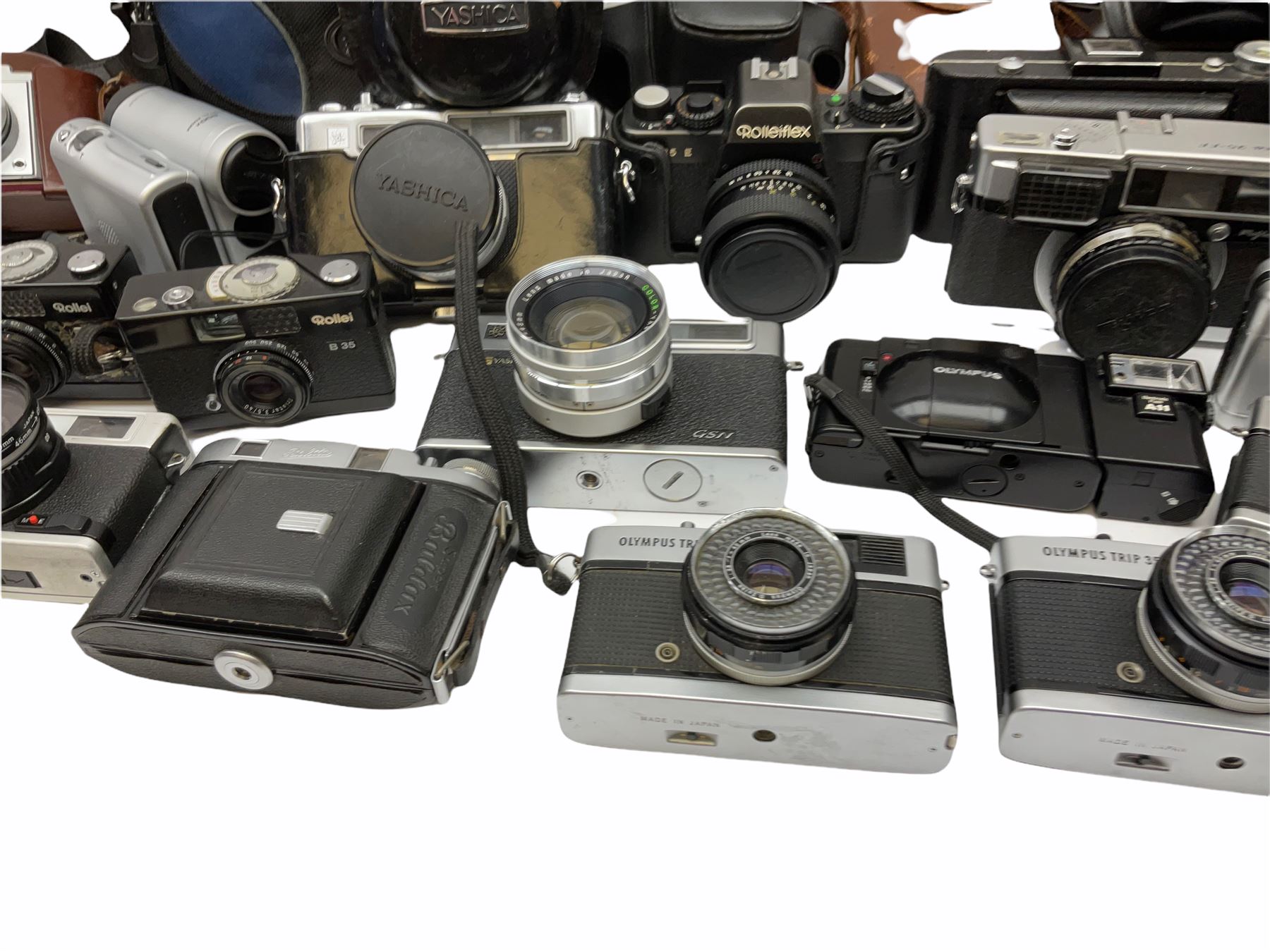Collection of cameras, to include three Olympus Trip 35,  Balda Super Baldax, Seagull 4A TLR Camera, Pentax MG, Pentax-MV1, Yashica, two Yashica Electro 35, Rollei B35, Fujica 35 EE etc. 