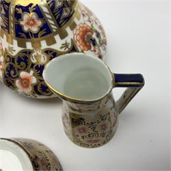 Pair of Royal Crown Derby 6299 imari pattern miniature vases, together with a miniature pitcher and dish in 2451 imari pattern, all with printed marks beneath, vase H12cm 