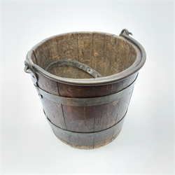 A Victorian coopered oak bucket, with swing handle, excluding handle H28cm, D33cm. 