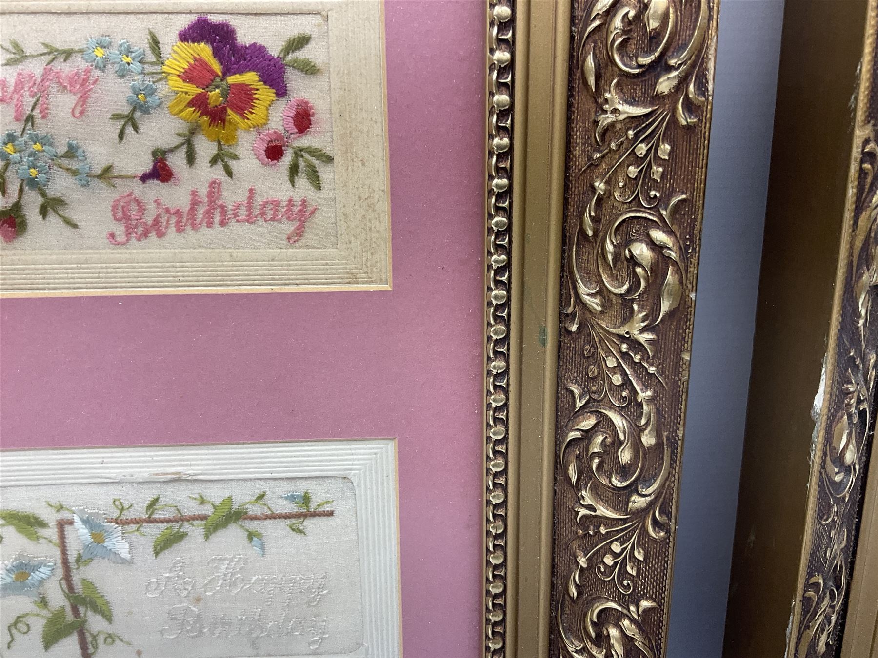 Thirty-five WW1 embroidered silk postcards including regimental crests, flags of the Allies, envelope type with greeting card inserts, Christmas and birthday cards etc; mounted and glazed in three graduated modern matching gilt frames (3)