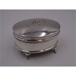 Edwardian silver card case, of rectangular form with shaped outer edge and engine turned linear decoration to body, with central monogrammed circular cartouche, H9.2cm, hallmarked Deakin & Francis Ltd, Birmingham 1903, together with a 1920s silver jewellery box, of plain oval drum form, engraved 'May' to hinged cover, opening to reveal part silk lined interior, upon four pad feet, H4.5cm, hallmarked J & R Griffin Ltd, Chester 1922 and a 1930s silver box, of circular form, engraved with monogram to hinged cover, hallmarked Barker Brothers Silver Ltd, Birmingham 1932