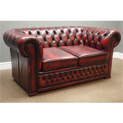  Two seat Chesterfield sofa upholstered in deeply buttoned ox blood leather, W157cm, D88cm  