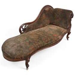 Mid-19th century mahogany chaise longue, shaped and rolled back carved and pierced with scrolling leaf decoration, upholstered in floral pattern fabric, on cabriole feet with brass and ceramic castors