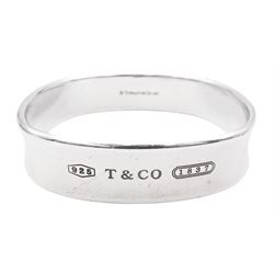 Tiffany & Co silver 1837 square cushion bangle, hallmarked London 2006 and stamped Tiffany & Co 925, with original pouch and box
