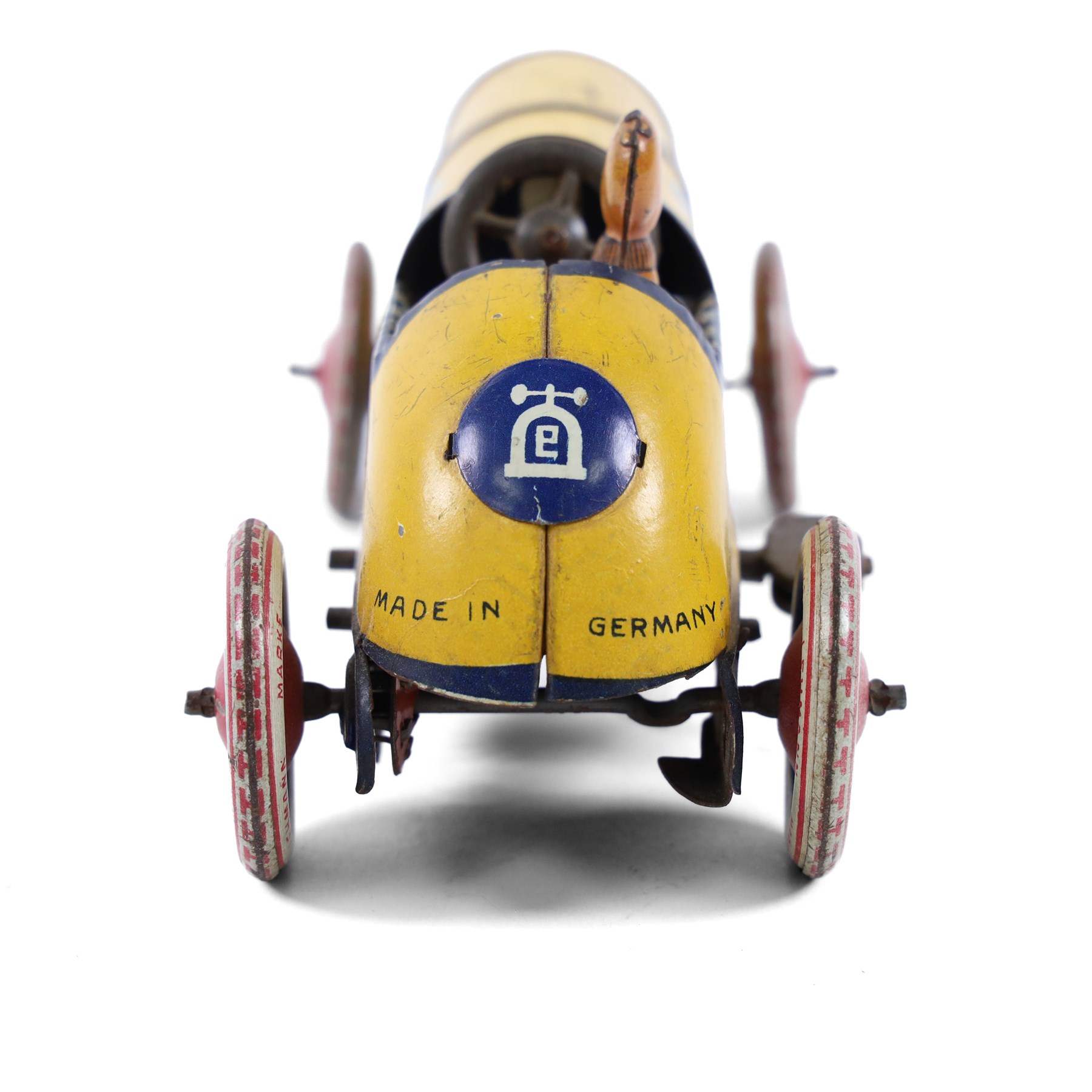 Early 20th century Lehmann tinplate clockwork 'Galop' no.760 racing car, yellow with blue stripes, driver and lithographed details, H6cm, L14cm