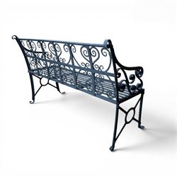 Regency period wrought iron garden bench, hand forged in wrought iron and finished in matt black paint, decorated with intricate scrollwork and featuring circular geometric ends, strapwork seat