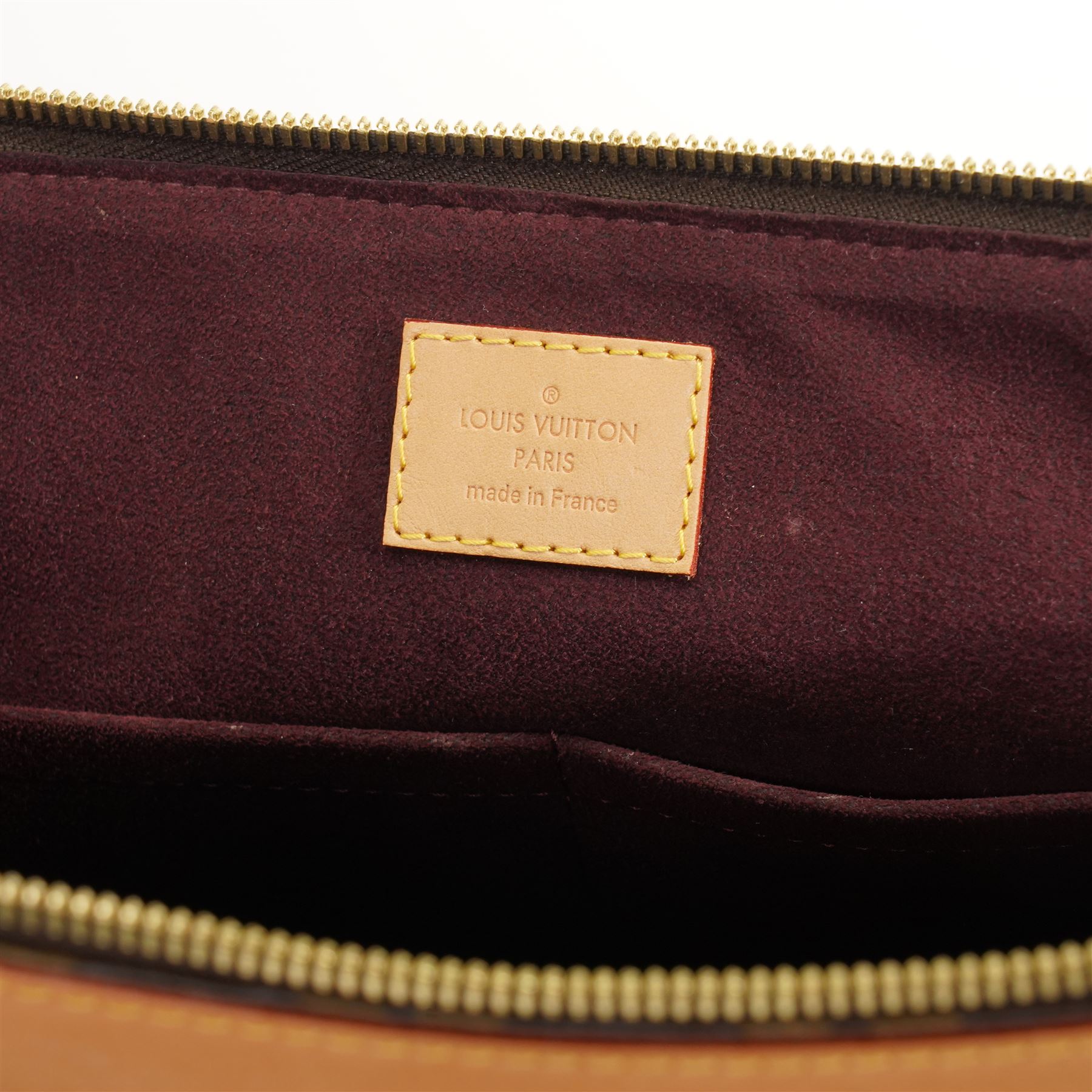 Louis Vuitton - ‘Estrela’ MM NM Tote Bag, circa 2015, in signature monogram coated canvas with natural Vachetta leather trim, with twin top handles and detachable shoulder or crossbody strap over expandable sides, the interior in burgundy suede with pocket divisions, base width 32cm, with original dust bag