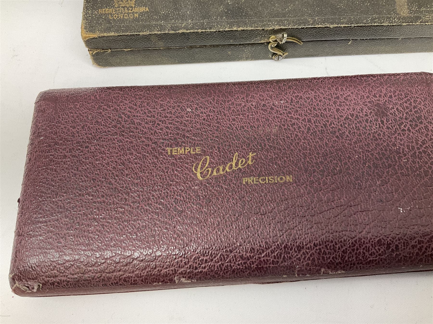 Negretti & Zambra drawing instrument set, the ruler with manuscript name 'F/Sgt. F. Hamilton R.A.F. 194(?)', cased; four other drawing instrument sets by Anker-Precision Germany, EcoBra, Temple etc, all cased; and quantity of loose drawing instruments