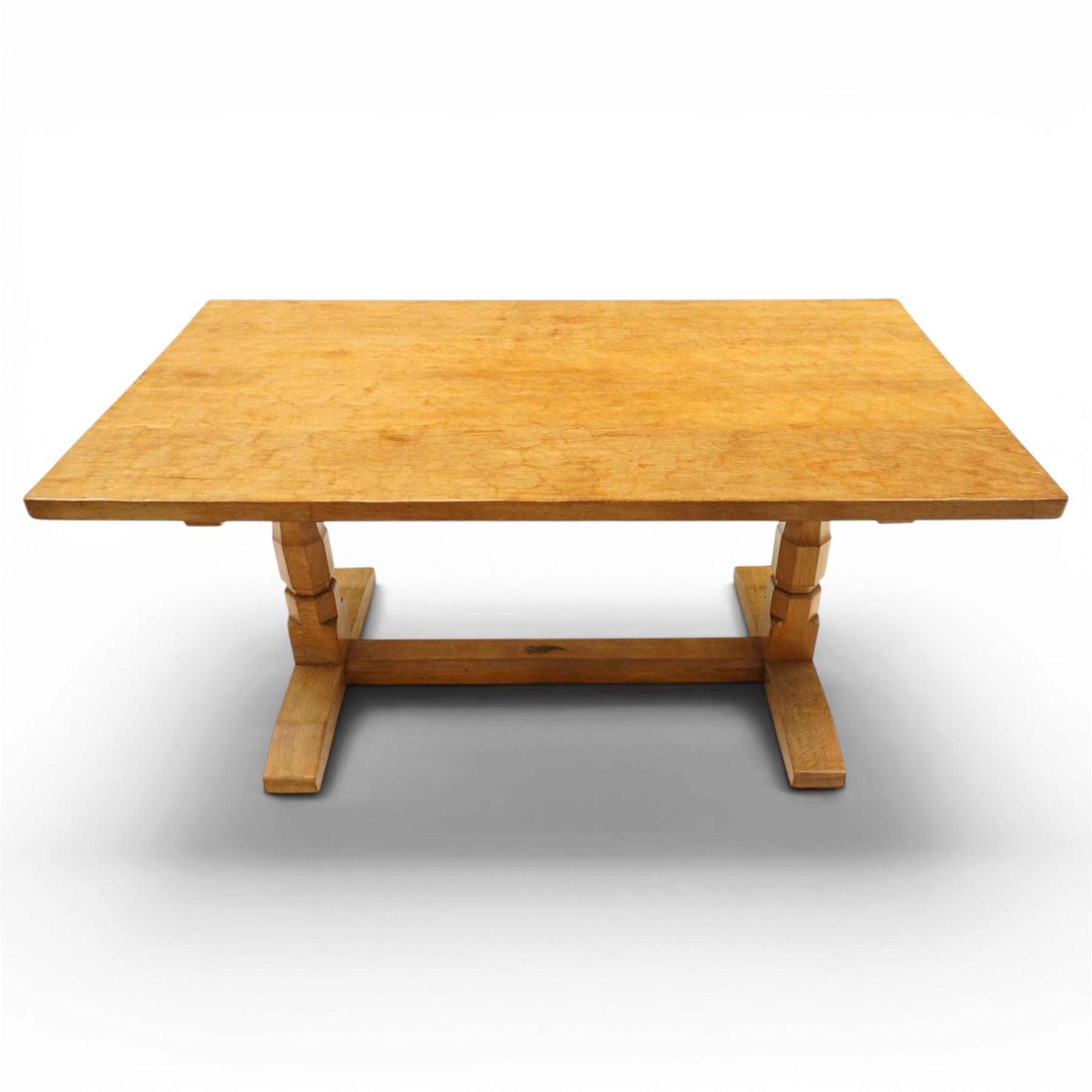 Lizardman - 5' oak refectory dining table, rectangular adzed top, octagonal turned supports united by stretcher with carved lizard signature, by Derek Slater of Crayke