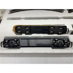 Hornby '00' gauge - Intercity 125 2-car set Nos.43010 & 43011 with one coach in original box with track and additional 4-6-0 locomotive and tender No.7476 and goods wagon; and another similar HST Intercity 125 2-car set Nos.43125 & 43126 with two coaches in original box with track and controller (2)
