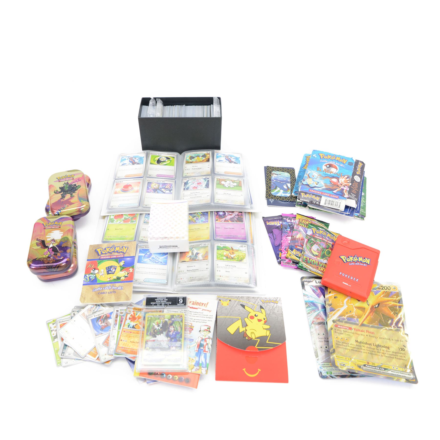 Collection of modern Pokemon TCG trading cards from the Scarlet & Violet and Sword & Shield eras, contained within in two folders, opened packets and loose, together with a graded Sword & Shield Silver Tempest Passiman TG08, GET Graded 9 Mint, two oversized cards, energy cards, vintage booklets and boxes, empty tins, 1998 Electronic Pokédex and other accessories