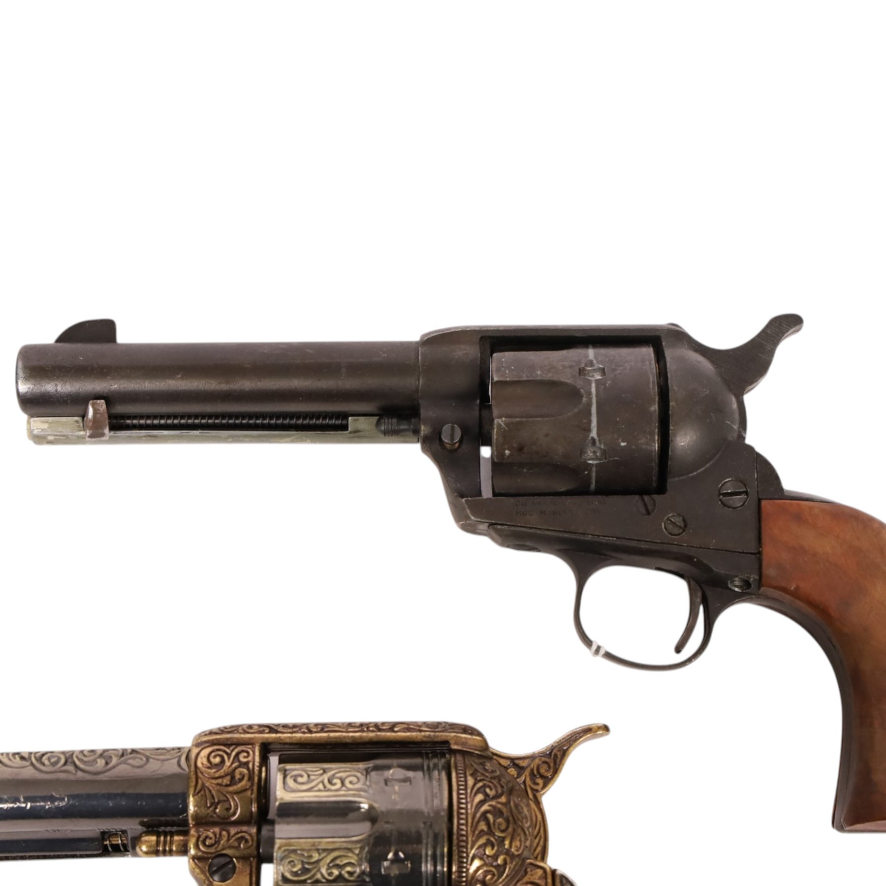 Two replica colts, each with a leather holster 