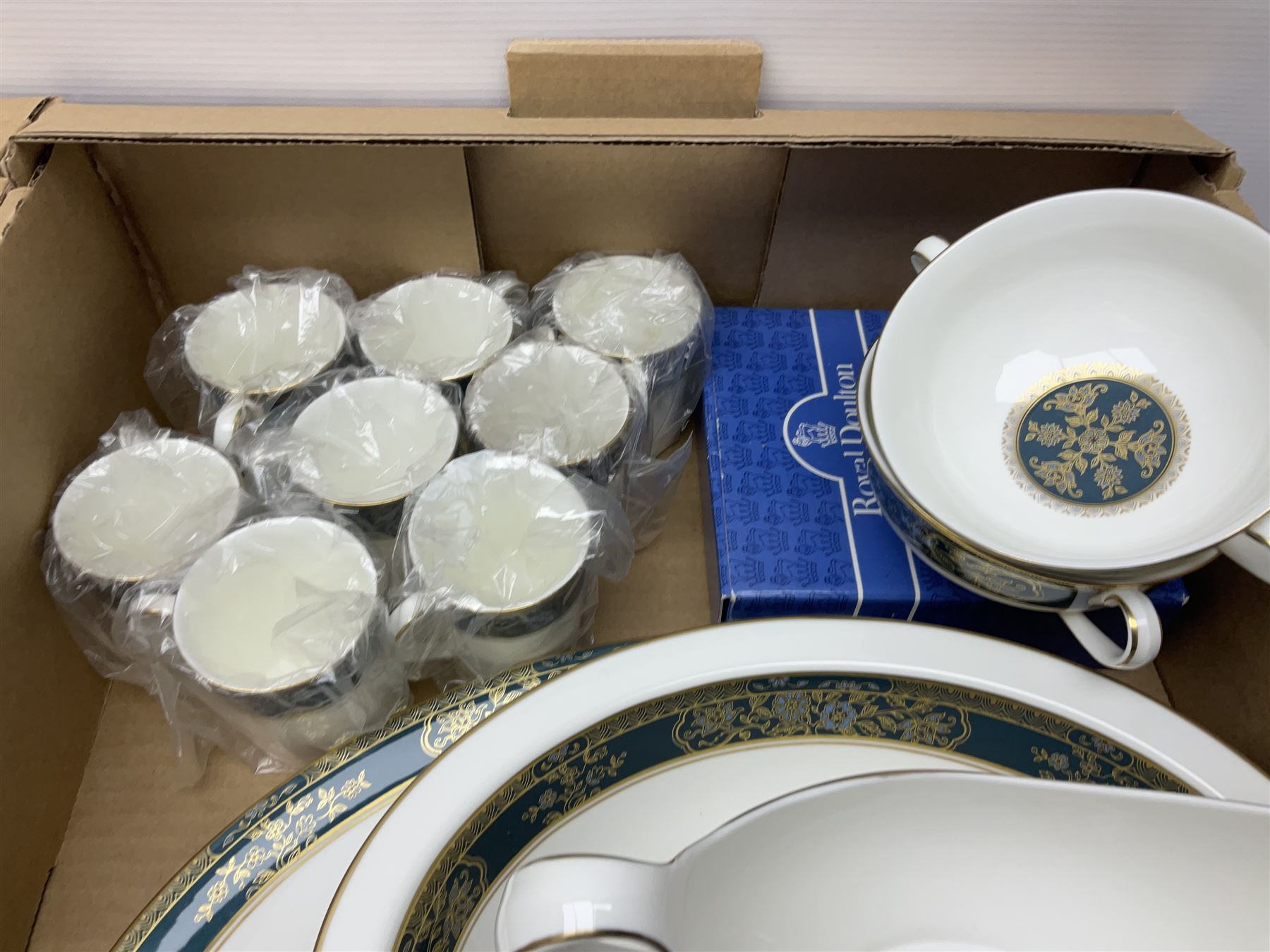 Royal Doulton Carlyle pattern part dinner service, including eight dinner plates, sixteen side plates, eight bowls, eight coffee cans and saucers etc (68)