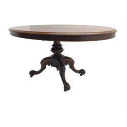Victorian mahogany oval loo table, moulded edge with banded frieze, raised on baluster turned pedestal with quadrupod base, cabriole supports with scroll feet and castors