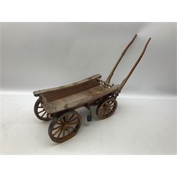 Approximately forty seven ceramic Shire horses to include Sylvac and Melba Ware examples of various sizes and colours, many with harnesses, and a quantity of carts and wagons 