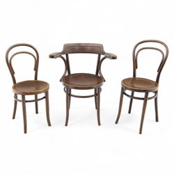 Set of three bentwood café chairs in the manner of Thonet, including a pair of side chairs (W 37cm, D 45cm, H 86cm) and a matching armchair (W 70cm, D 46cm, H 81cm), each with pressed seat decoration and continuous loop backrest