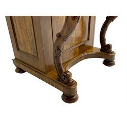 Fine and unusual 19th century olivewood piano top davenport, raised shaped back carved with olive branches and olives, the top hinges to reveal lidded and correspondence compartments, the piano lid enclosing sliding top with hinged and adjustable writing surface with leather inset, right-hand panelled door enclosing four drawers, olive branch and scroll carved cabriole front supports on moulded and shaped platform, turned cup feet with recessed castors 