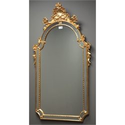  Ornate mirror in gilt cushion frame, shell and floral pediment, 63cm x 115cm  