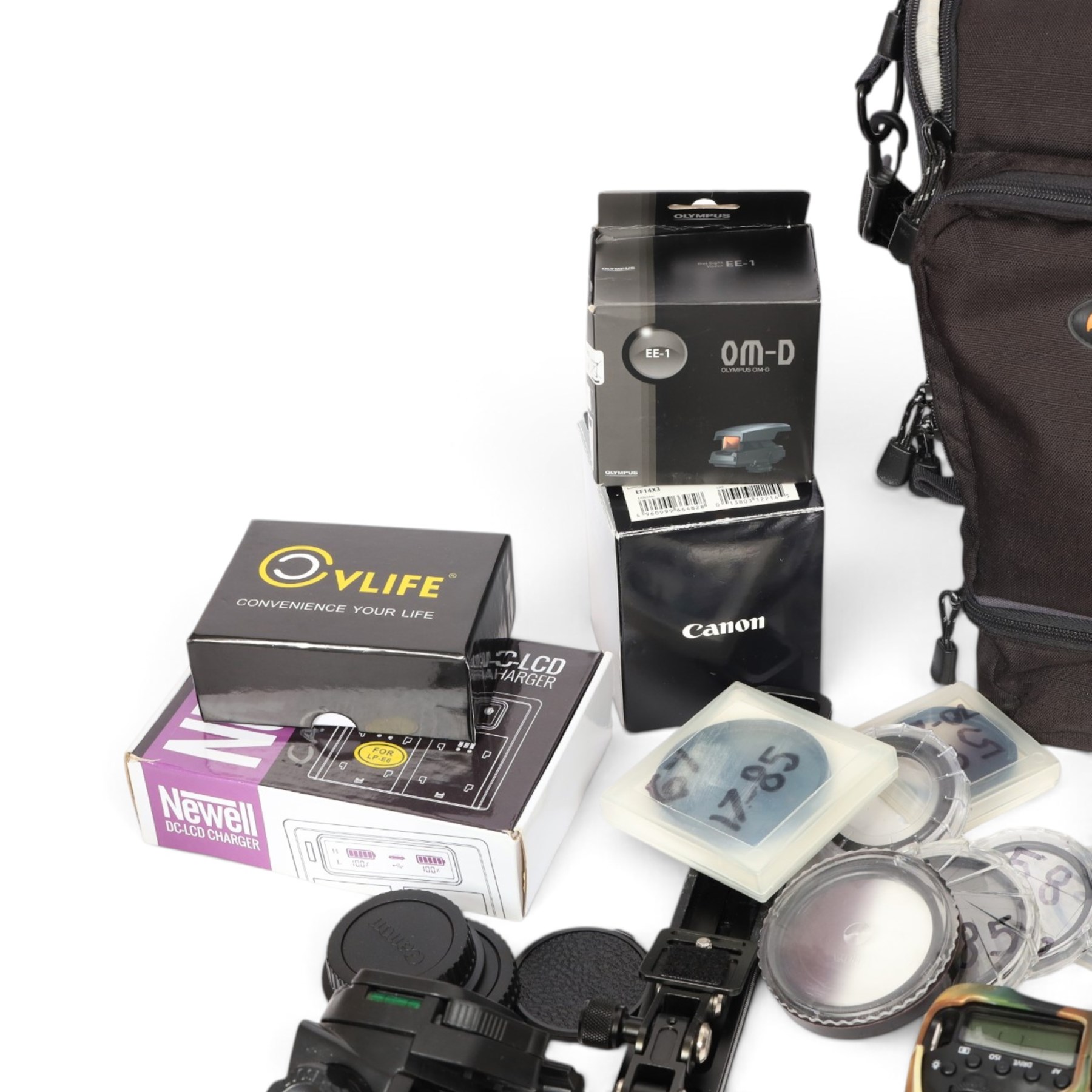 Canon EOS 90D DSLR camera body serial no. 064051002694, in a silicon camouflage case, with a Canon EF-S 17-85mm 1:4-5.6 Image Stabilising Ultrasonic zoom lens serial no. 4512926109, Canon Extender EF 1.4 x III and other accessories including Lowepro carry case, Visionary clamp, Canon Speedlite 430 EXII, Ultimaxx Grip Stabiliser, Newell Dual Battery Charger, Very100 sight, Olympus OM-D EE-1 dot sight, various filters, etc