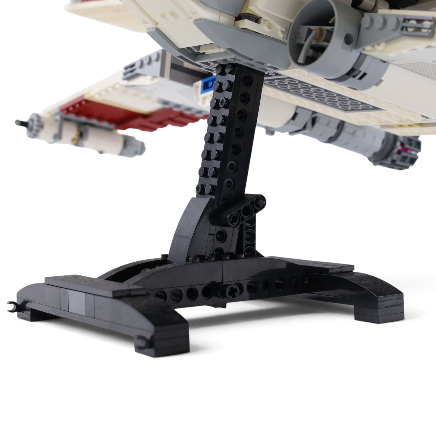 Three Lepin Star Wnrs built models, comprising Red Five X-Wing Starfighter no. 05039, Millennium Falcon no. 05132 and Super Star Destroyer no. 05028