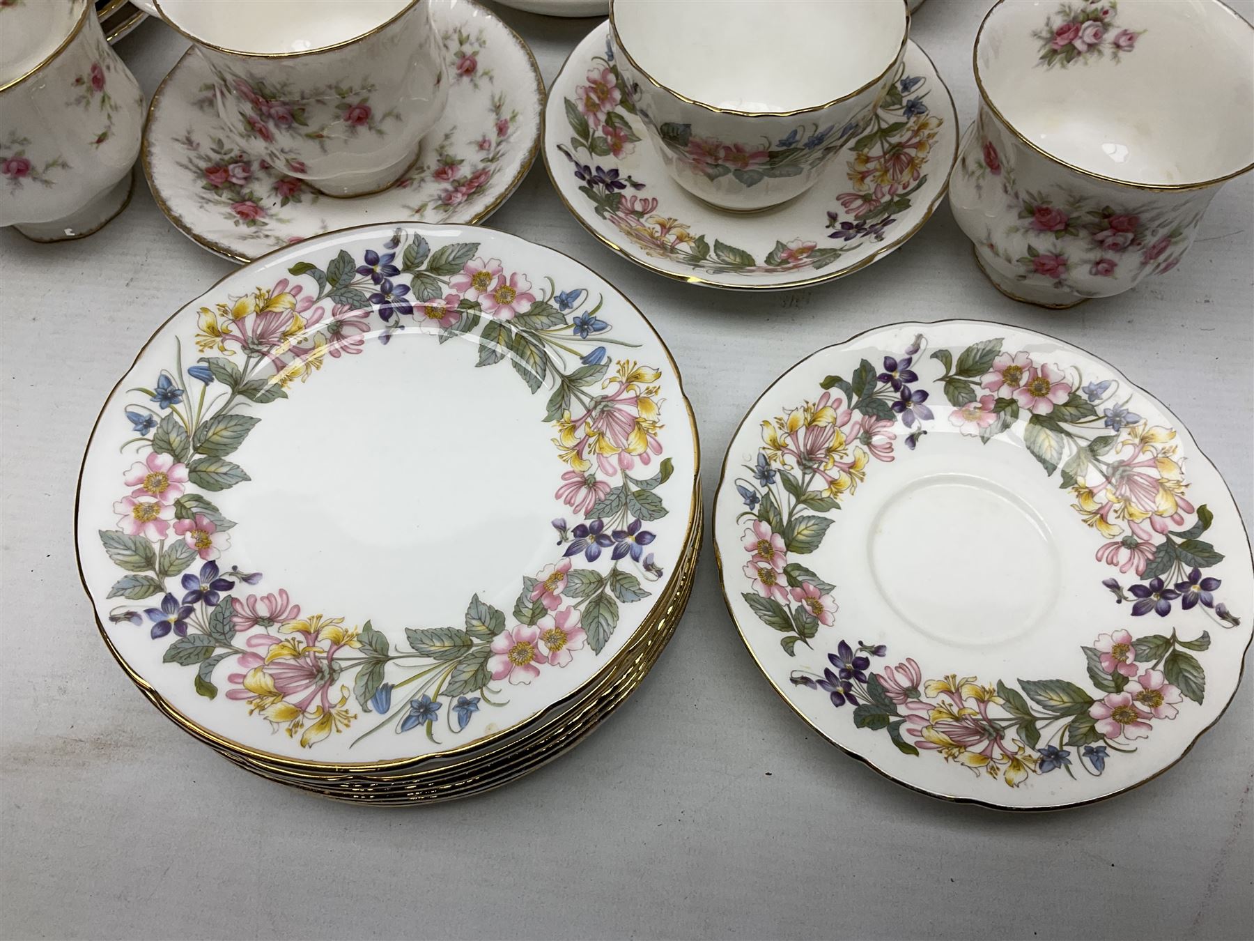 Paragon Victoriana Rose pattern tea service six and Paragon Country Lane pattern tea service for two and Vienna style plate