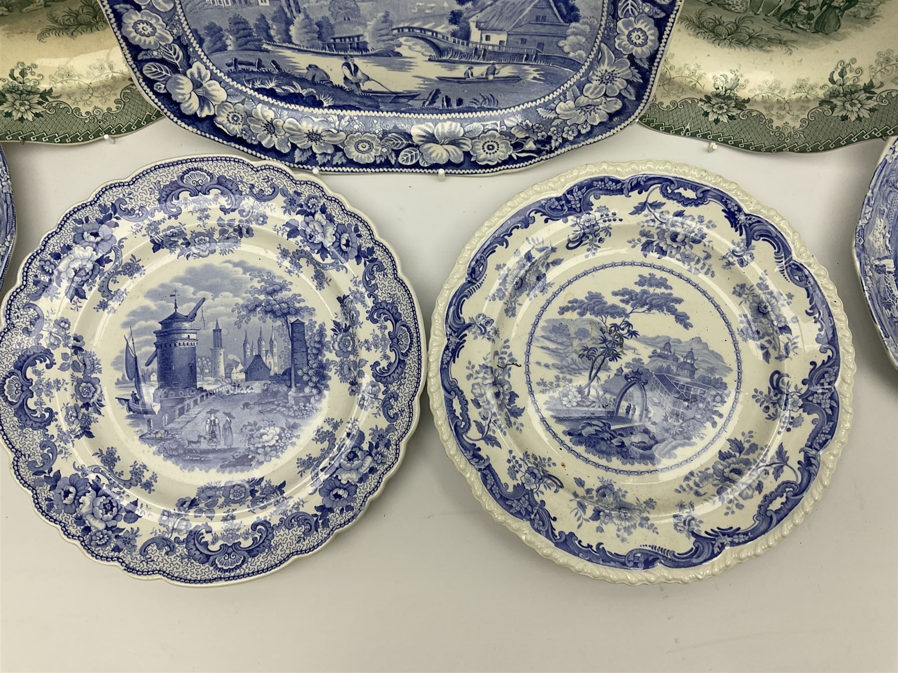 A pair of John Ridgway soup bowls, transfer printed in green with the Giraffe pattern, together with a group of other 19th century blue transfer printed wares, including a pair of Walmer pattern dinner plates. 