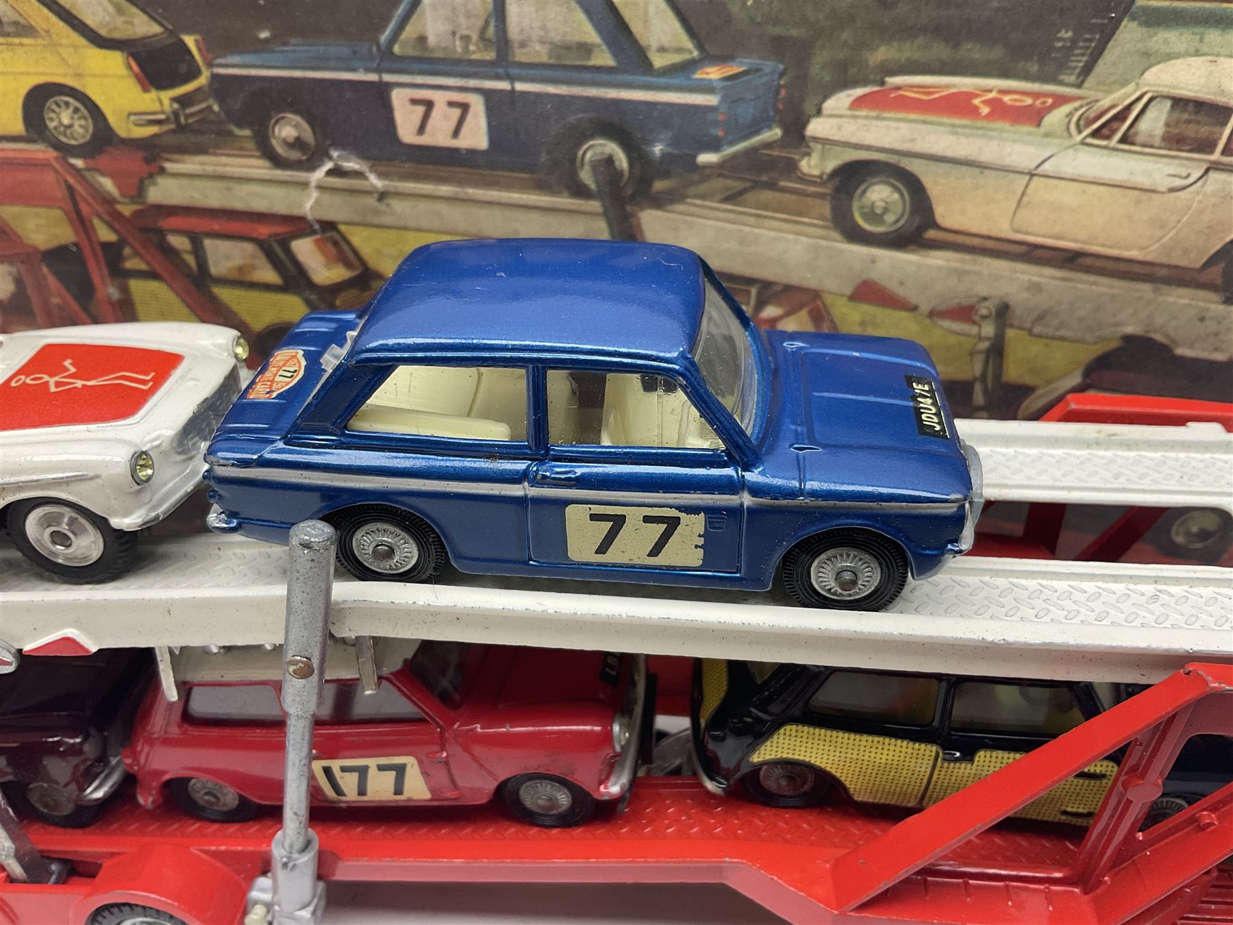 Corgi - Gift Set no.41 comprising Carrimore Mark Iv Transporter, Morris Mini-Cooper, BMC Mini-Cooper S, Morris Mini-Minor, Volvo P.1800 and Sunbeam IMP; missing MGC GT car; in original box 