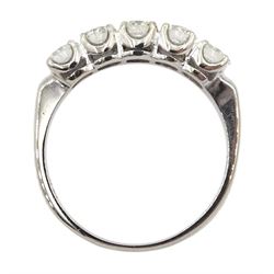 American white gold five stone diamond ring, stamped 14K by Balco Diamonds, Beverly Hills, total diamond weight 1.05 carat, with Ballreich & Co insurance certificate