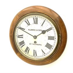 Late 19th century circular wall clock in stained beech case by ‘Aldred & Sons, Gt. Yarmouth’, single train driven movement 