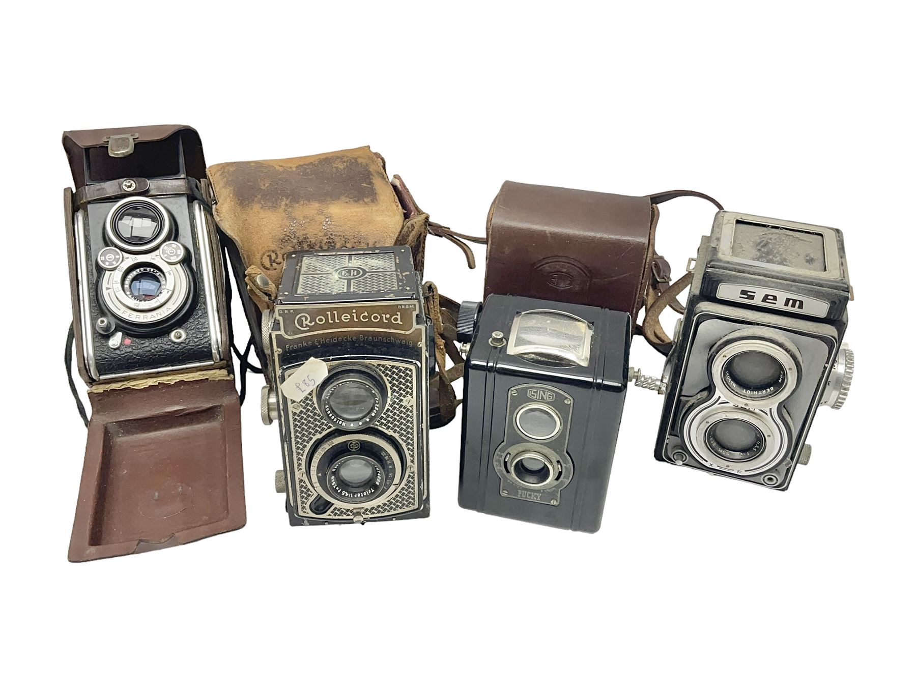 Franke & Heidecke Rolleicord twin lens camera, serial number 012706 with Heidoscop-Anastigmat f=7.5cm' lens and a 'Carl Zeiss Jena Triotar 1:4.5 f=7.5cm' lens, serial no 1474898, together with three similar cameras, including SEM TLR, serial no 420218, Ising Pucky box and Ferrania Elioflex, three in leather carry cases