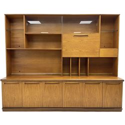 Mid-20th century teak bookcase wall unit (W201cm, H166cm, D46cm); similar teak corner shelf (H191cm, W63cm)