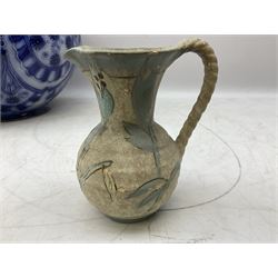 Replica ancient Greek hydria jug, of baluster form, decorated with figures, birds, fruits and foliage on mottled blue and purple ground with gilt key fret banding, with label reading 'Nachbildung Der Klassischen Periode 550-450 v Chr' and tag, together with further jug, largest H27cm