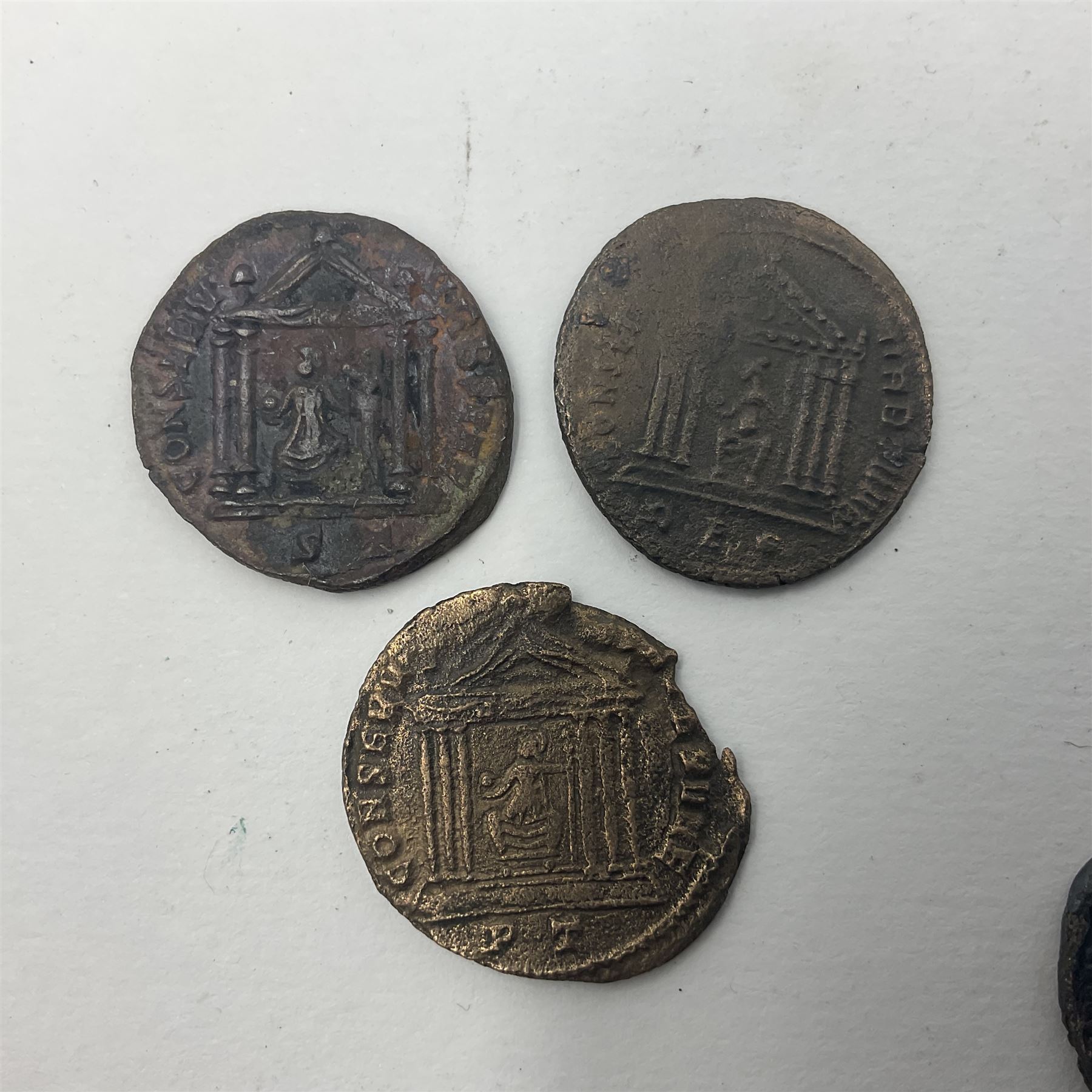 Roman Imperial Coinage, Maxentius (AD 306-312), fourteen bronze folles, most bearing rev. Roma seated in temple holding globe and sceptre (14)