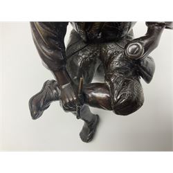 Oriental bronze figure of a gentleman, modelled seated upon barrel with a pipe in one hand and a flask in the other, H21cm