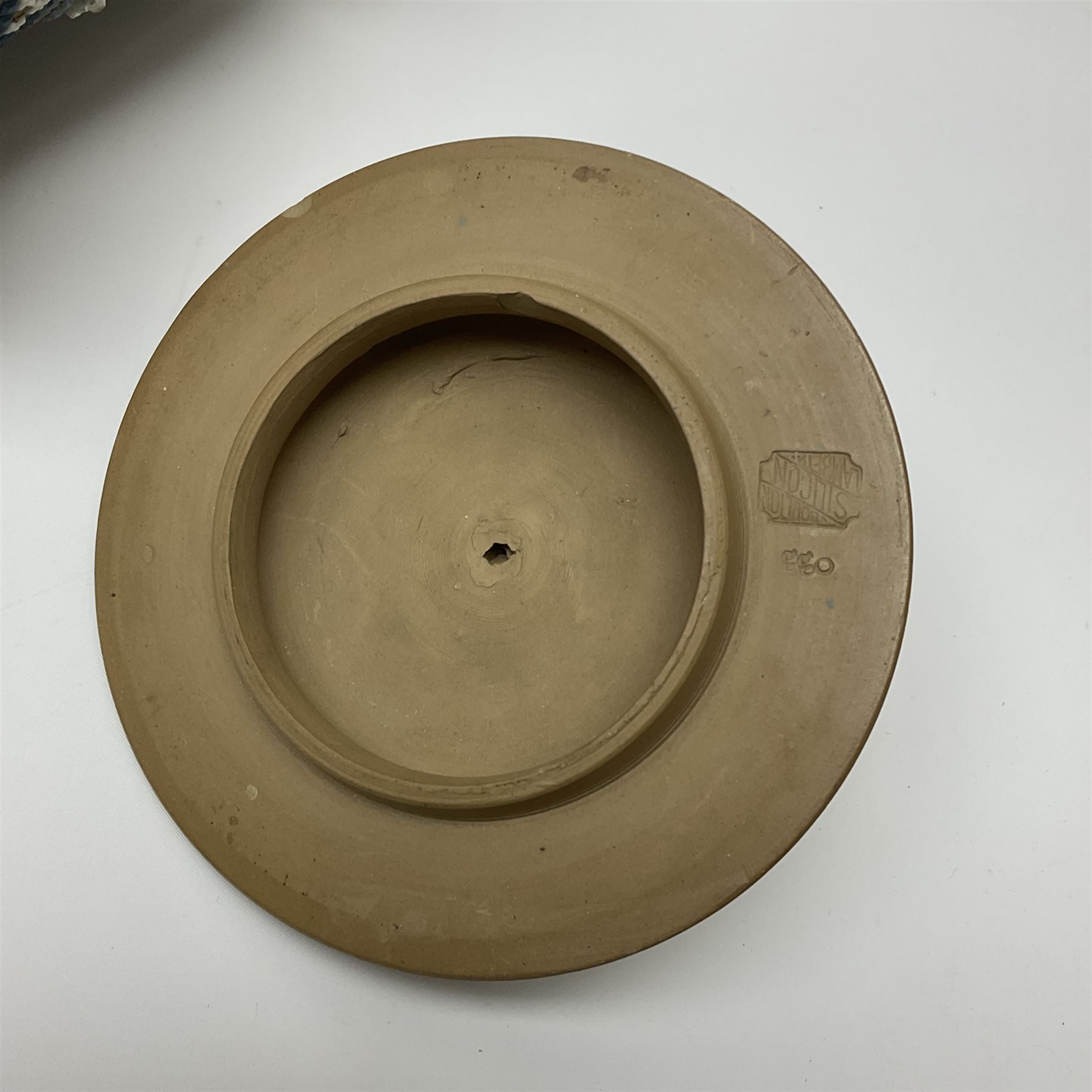 A late 19th century Doulton Lambeth stoneware water filter with original spigot, decorated with relief moulded foliate bands, with impressed marks and monogrammed for Laura Gooderham beneath, H34cm. 