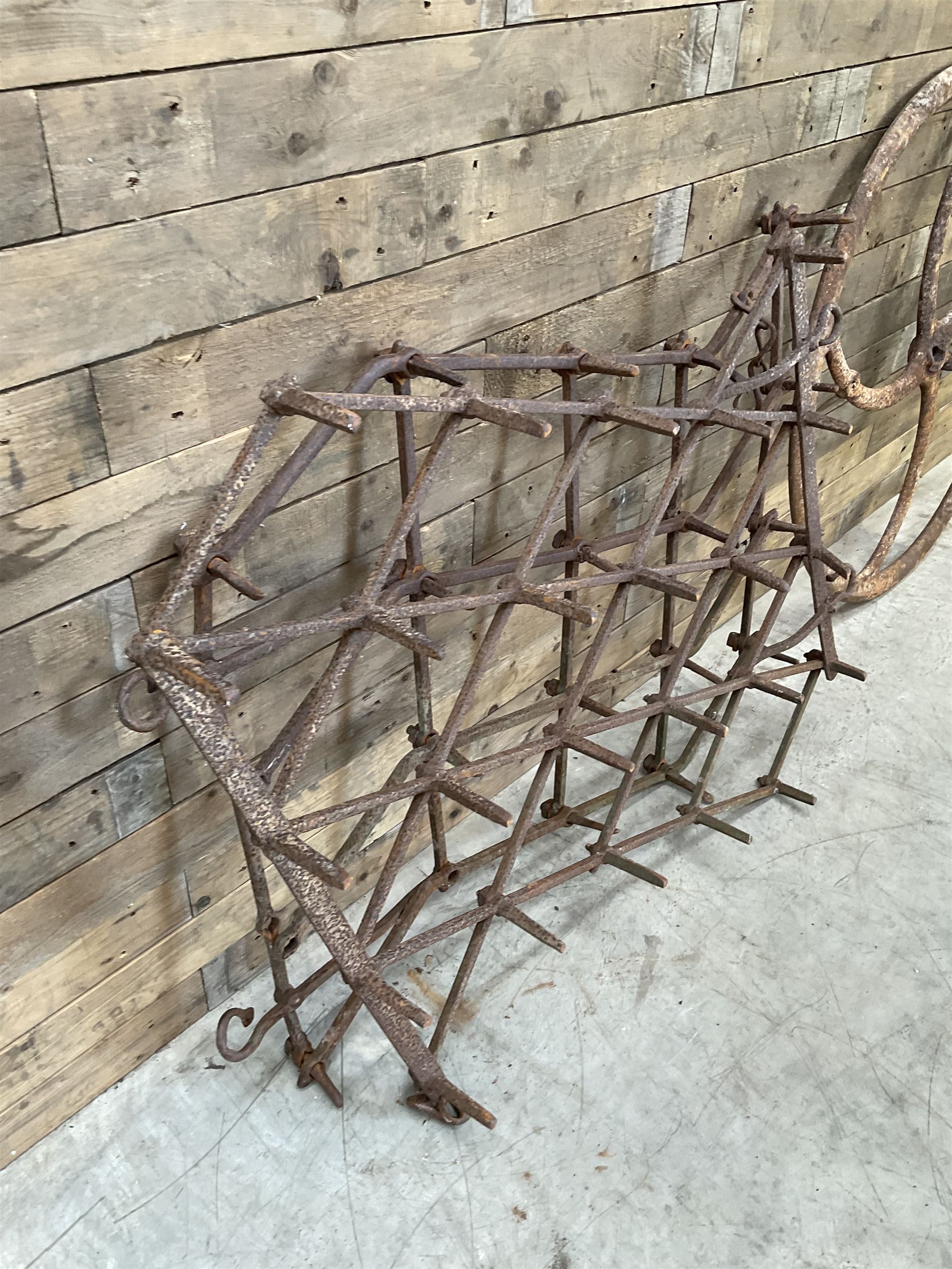 Two vintage agricultural harrows and cast iron machinery wheel/gear
