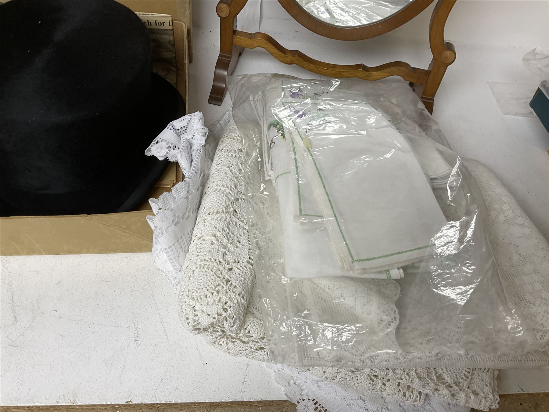 1960s Moss Bros black top hat, together with a wooden swing dressing table mirror and a collection of embroidered and other linen 