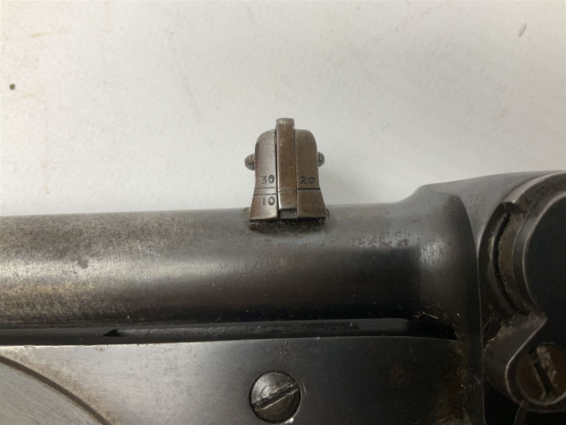 BSA .177 air rifle with top loading under lever action, walnut stock carved with chequered BSA logo to grip, serial no.A1203 L102cm