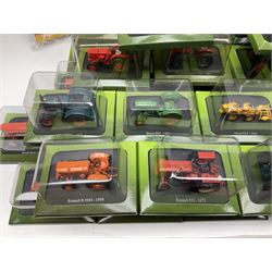 Eighteen issues of Tractors and The World of Farming magazine, together with sixty diecast tractors, all in original packaging, in three boxes 