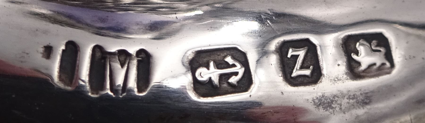 Victorian silver mounted blue glass trumpet vase, the silver mounts with pierced and embossed floral, C scroll and lattice decoration, with frilled rim, upon stepped circular foot, hallmarked Henry Matthews, Birmingham 1899